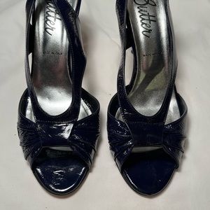 Butter handmade in Italy. Never worn. Blue patent leather high heel sandal